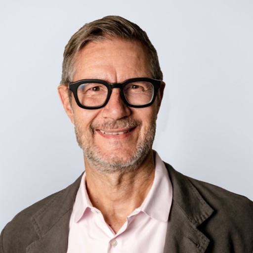 Dr. Rico Travella